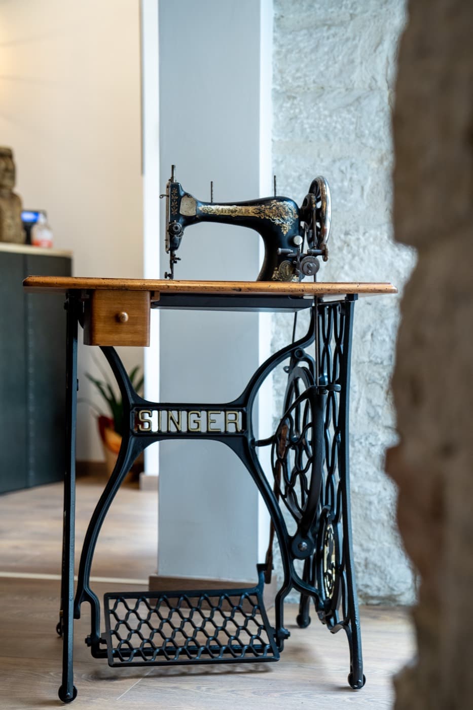 A sewing machine in the Caprice Bespoke atelier where partner brand orders are produced