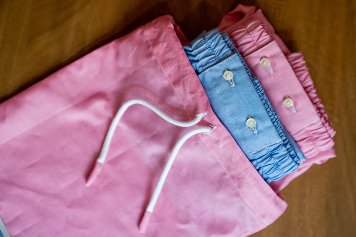 Pink and blue cotton drawstring shorts produced to a brand specification