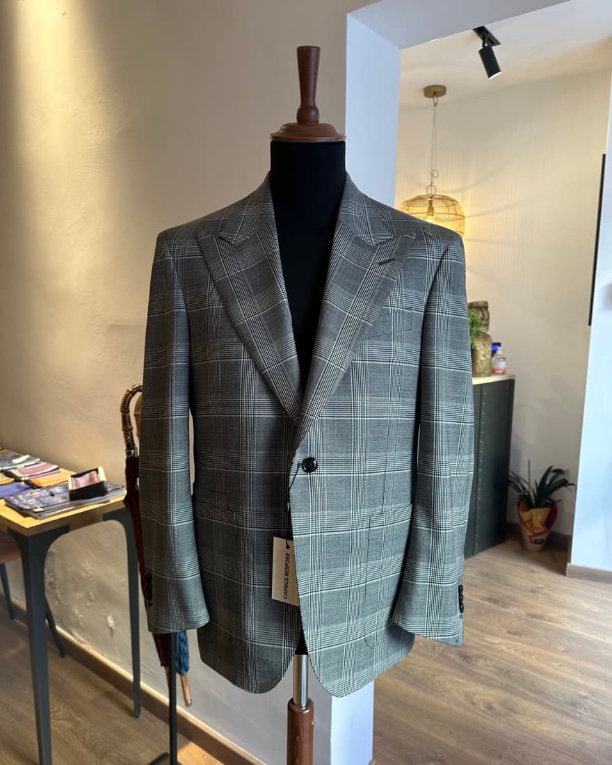 A glen-check jacket cut from Italian mill cloth, showing fabric detail